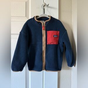 Patagonia kids fleece. Blue, red and beige. Size 4T l. Good condition